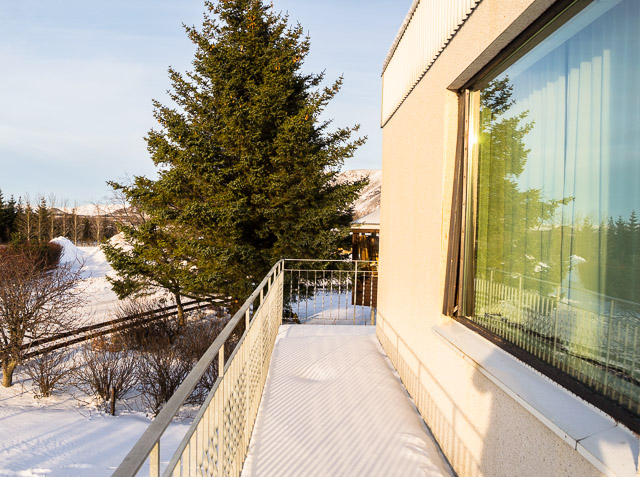 Thoristun villa, balcony - in winter with a view towards the mountains.
